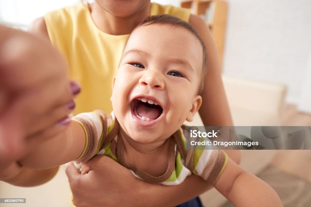 Happy child Joyful Vietnamese kid Selfie Stock Photo