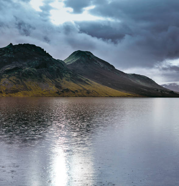 istock Lake coast with mountain reflection, Iceland 682084640