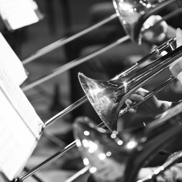 istock Trombones in the hands of the musicians 682084884