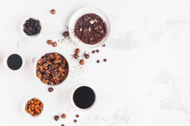 istock Cups of coffee, chocolate cake, chocolate muesli 682088358