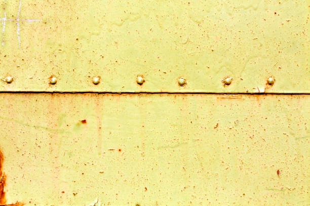 rusty metal plate surface with rivets. - 6726 imagens e fotografias de stock