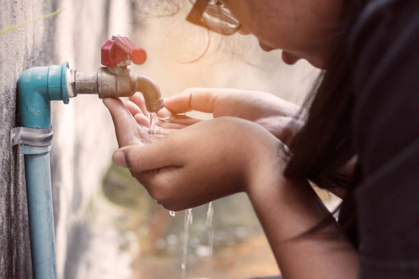 istock Girls are drinking water in the park. 682096044