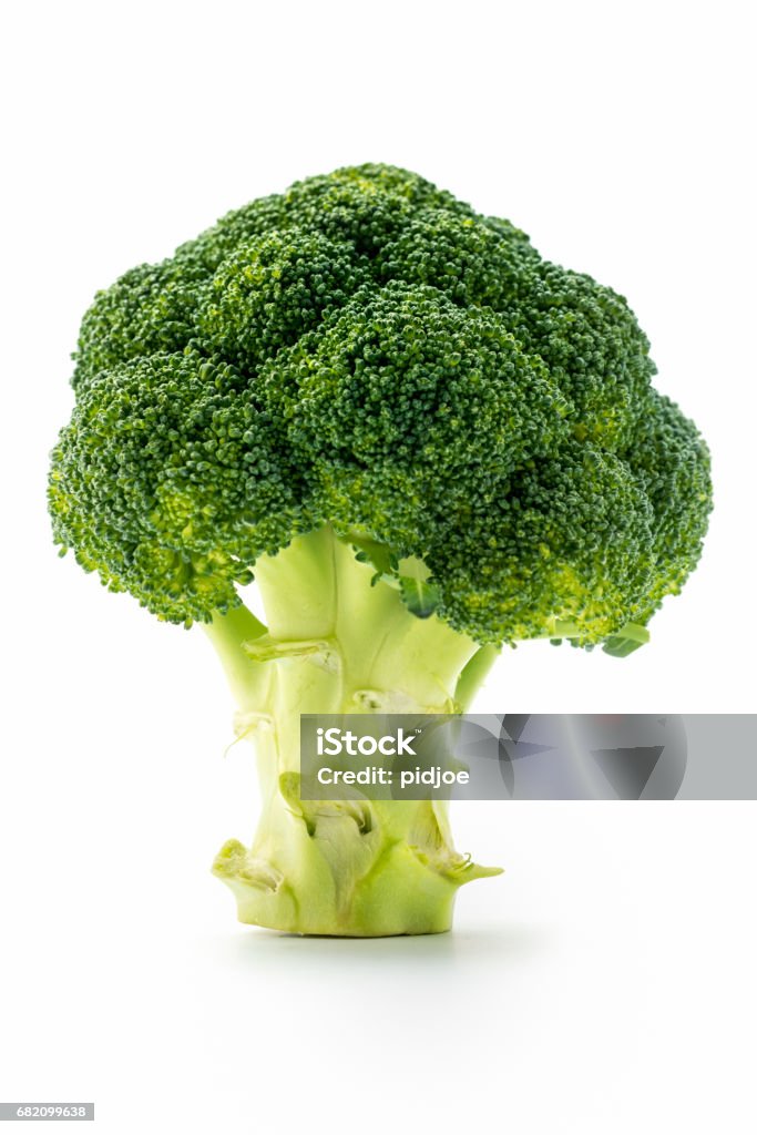 Broccoli head on white background. Close up isolated Broccoli on white. Selective focus Broccoli Stock Photo