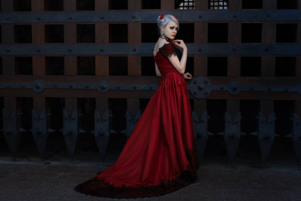 istock Woman in a long red dress. 682104048
