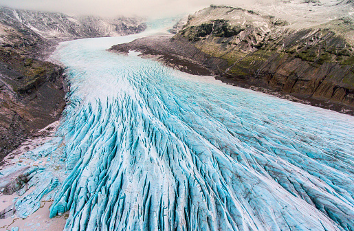 Aerial view of Glaciers meeting the ocean in Greenland