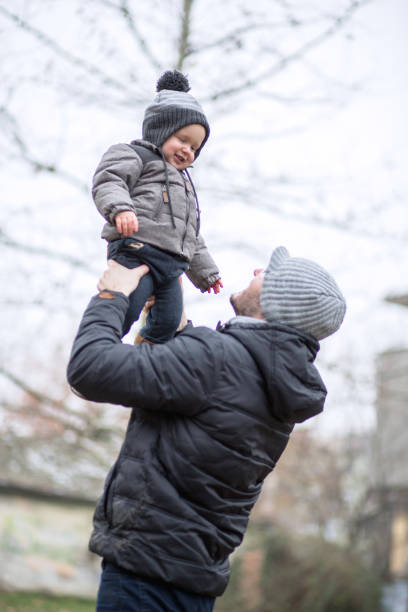 istock Young father with his baby boy enjoying outdoor activity. 682113576