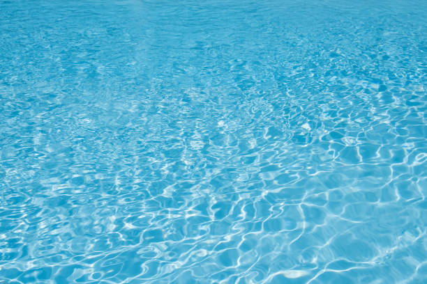 istock Beautiful ripple wave and blue water surface in swimming pool 682117108