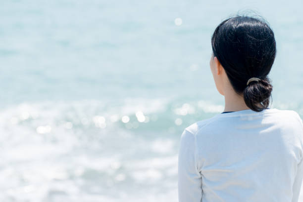 istock Woman at the seaside 682118524