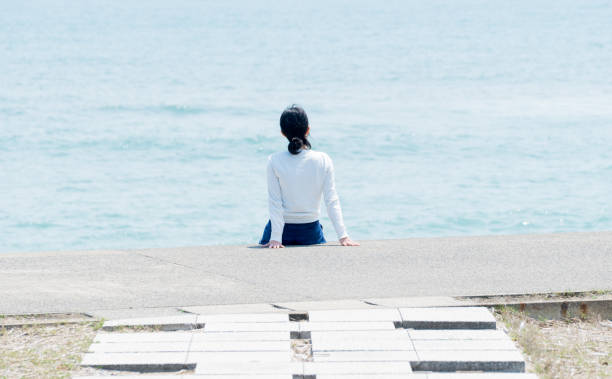 istock Woman at the seaside 682119294