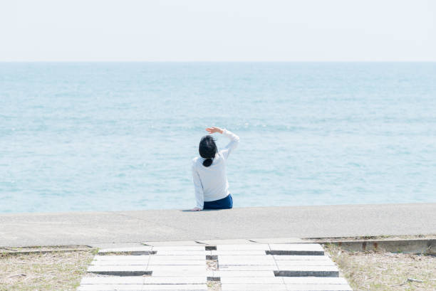 Woman at the seaside.