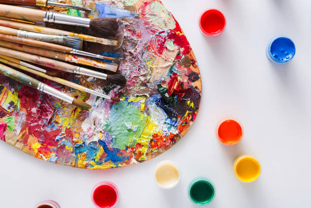 istock Art palette with colorful paint strokes, isolated 682123480