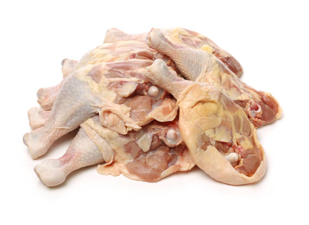 istock Raw chicken thigh  is on the wood background 682126494