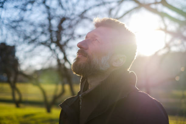 istock Portrait of an elderly man in a park. 682129516