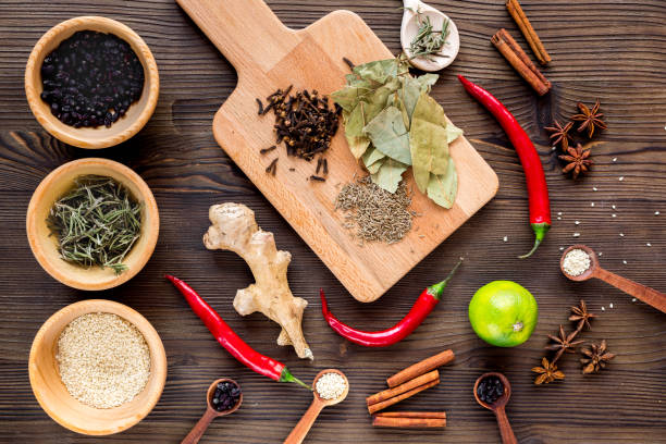 istock Cooking with spices, salt and pepper on kitchen table background top view 682133160