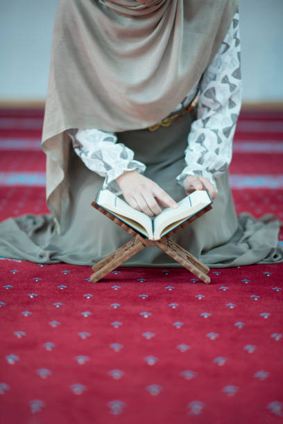 istock muslim woman praying in mosque 682150870