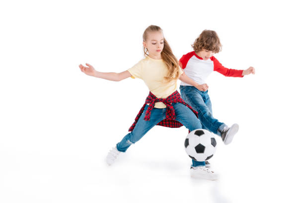 istock Children playing football 682151416