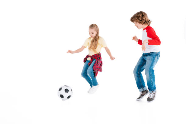 istock Children playing football 682151584