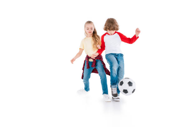 istock Children playing football 682151608