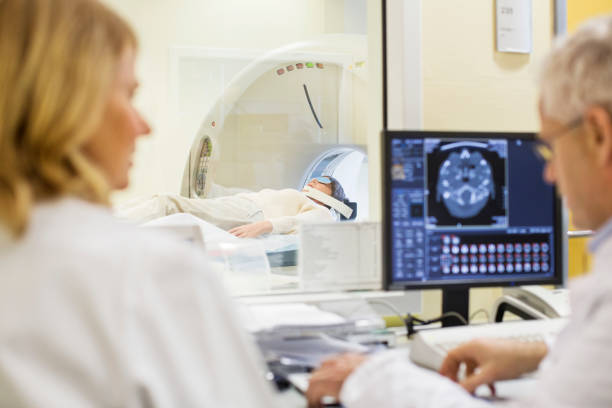 istock Doctors analyzing female patient in medical room 682152000