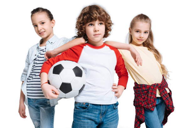 istock Children playing football 682154672
