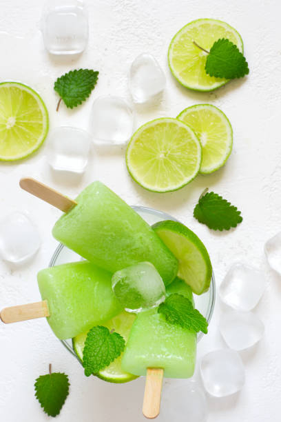 istock Healthy lime mint popsicles with fresh lime slices And ice cubes 682154974