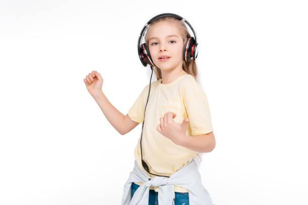 istock Kid in headphone listening music 682155324