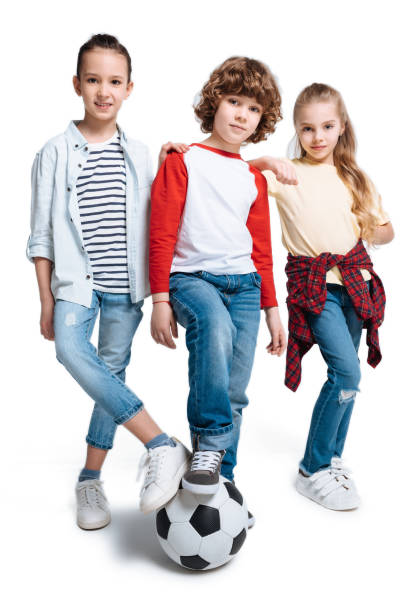 istock Children playing football 682158820