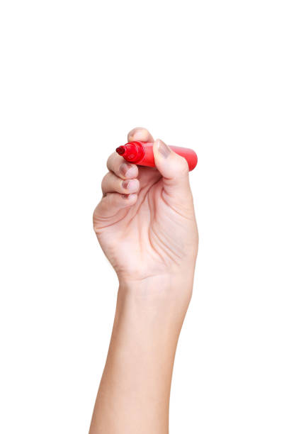 istock Female hand holding a red marker 682158990