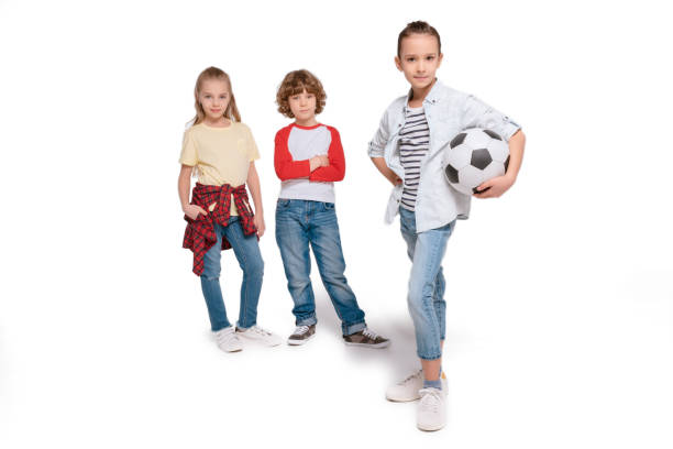 istock Children playing football 682159460