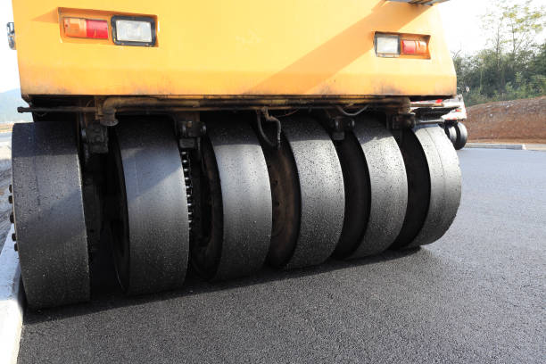 istock Road roller is rolling leveling the construction of new roads 682161966