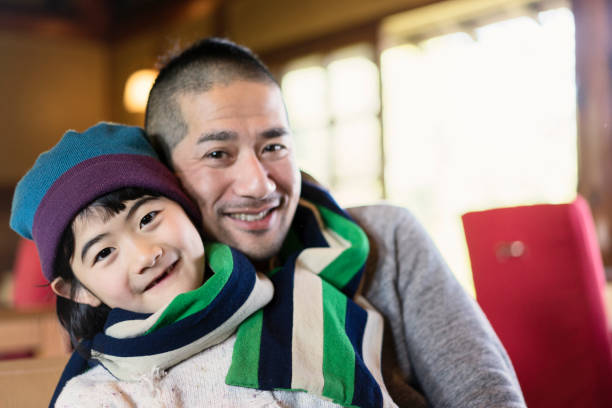 istock Asian family having fun time in cafe. 682162678