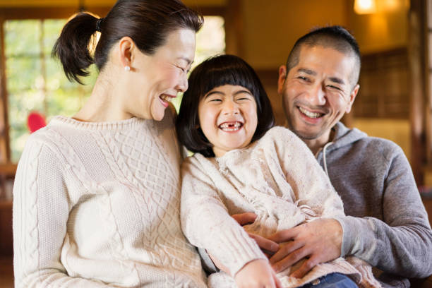 istock Asian family having fun time in cafe. 682162878