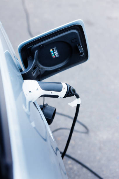 istock Electric car being charged 682167822