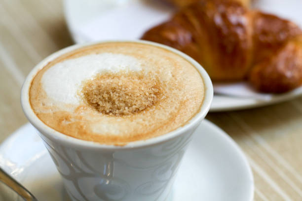 istock close up of cappuccino cup with brown sugar 682171362