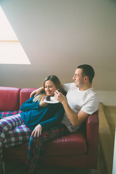 istock Young couple having a breakfast in the bed 682176450