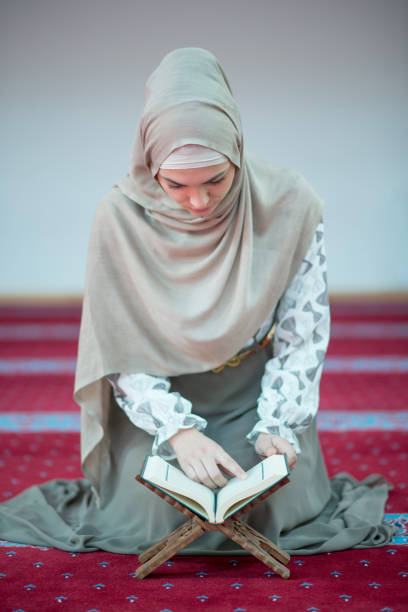 istock muslim woman praying in mosque 682183124