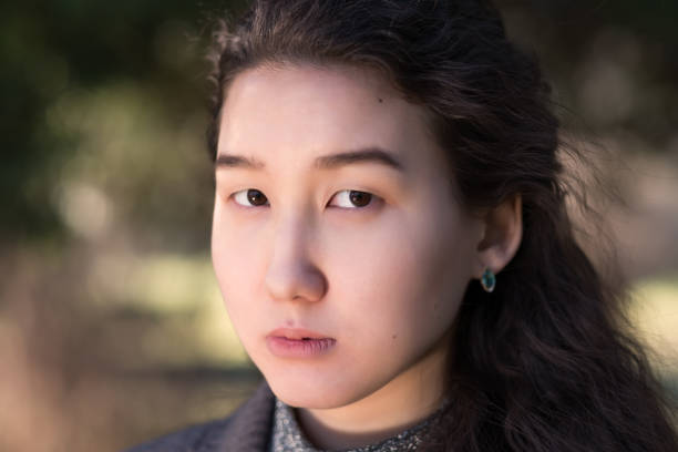 istock Pretty Asian girl in park 682186380