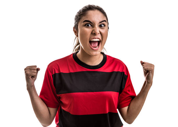 istock Soccer woman on red uniform celebrating on white background 682186648