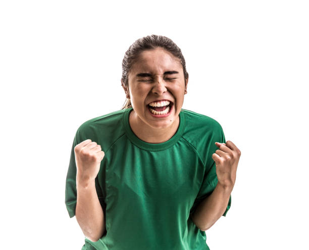 istock Soccer woman celebrating on green uniform isolated on white background 682186708