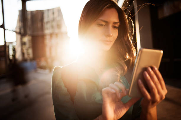 istock Girl looking her phone 682193324