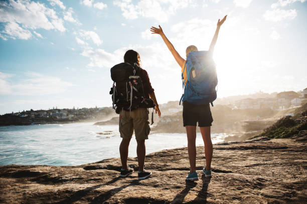 istock Friends backpackers at the cliff 682193460