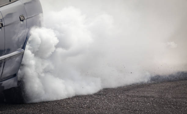 istock Smoke from under the wheels of the car 682193792
