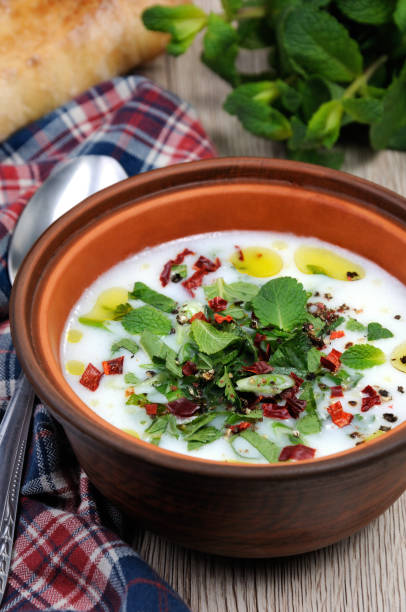 istock Refreshing old summer soup the rice, mint and yoghurt 682200644