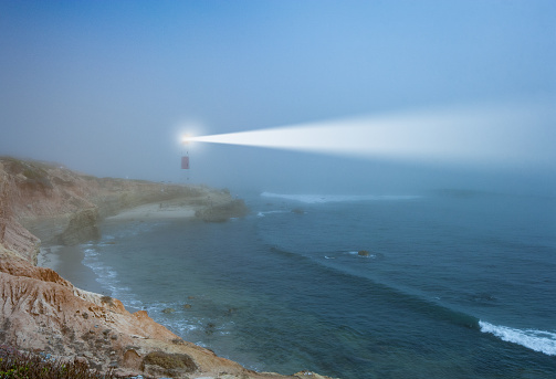 Lighthouse and incoming fog / bad weather