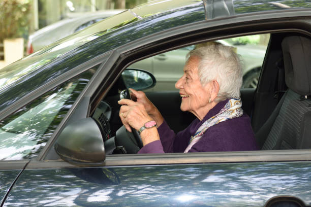 5,600+ Old Lady Driving Stock Photos, Pictures & Royalty-Free Images - iStock | Traffic, Excited old lady, Speed limit