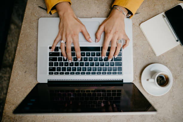 istock Top view on female blogger working in the cafe and drinking coffee 682204352
