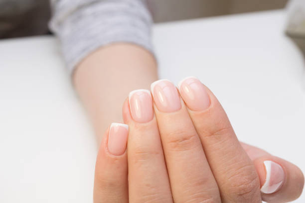 istock Attractive women's hands. Natural nails with beautiful manicure. 682204368