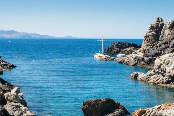 istock Small boats in blue water 682204942