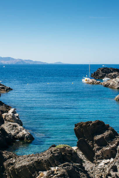 istock Boats in rocky bay 682205000
