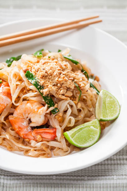 istock Pad Thai Stir Fried Asian Noodles With Shrimp, Egg, Tofu And Bean Sprouts 682207744